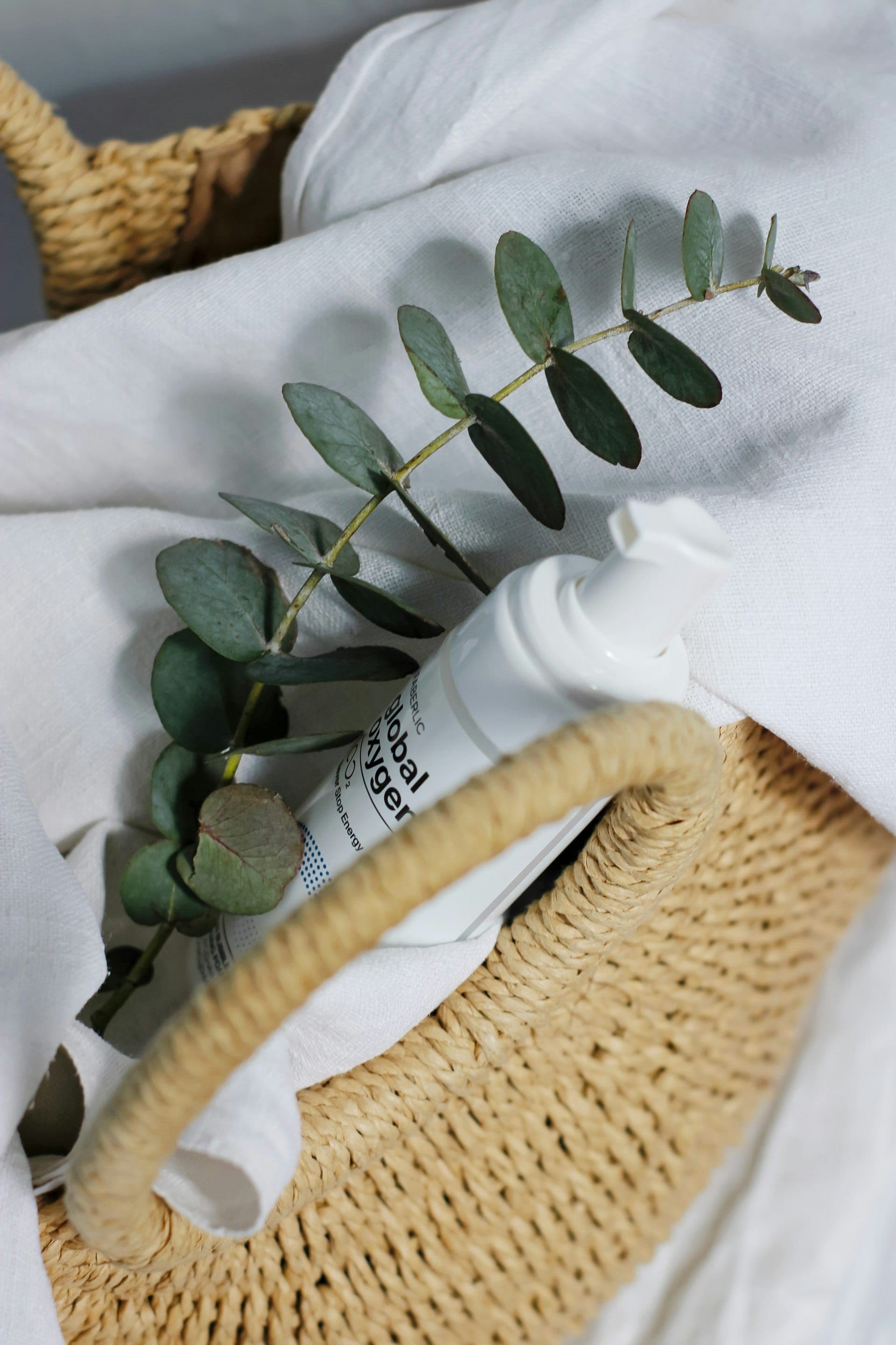 Eucalyptus sprig on a soft white textile